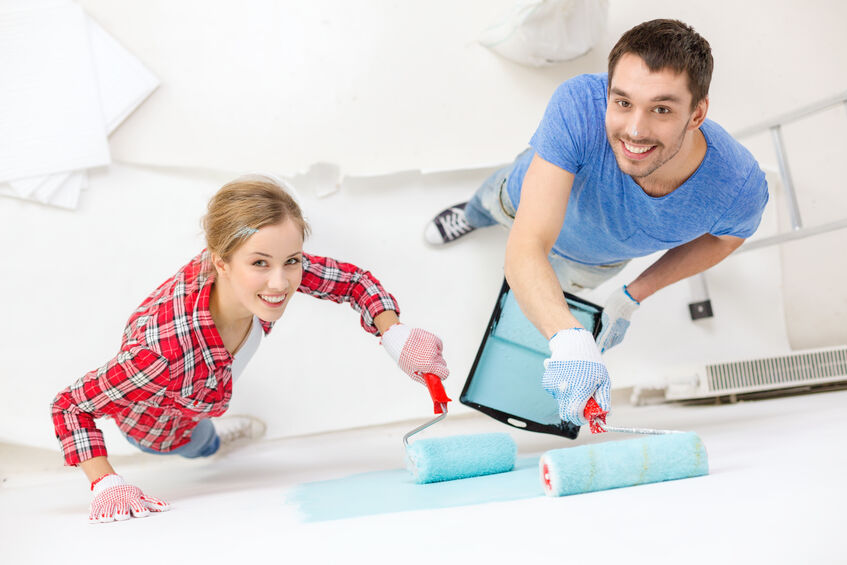 A happy couple choosing the perfect bedroom color